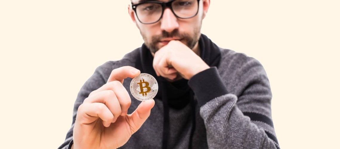 homem segurança moeda de Bitcoin