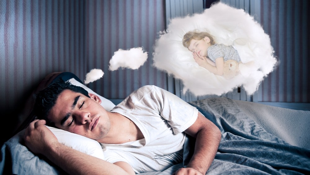 Sonhar com criança dormindo